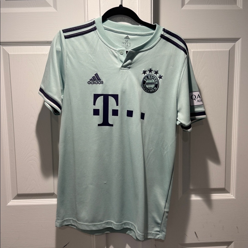 Adidas Mint Green Soccer Jersey with Navy Accents
Fc Bayern Munchen